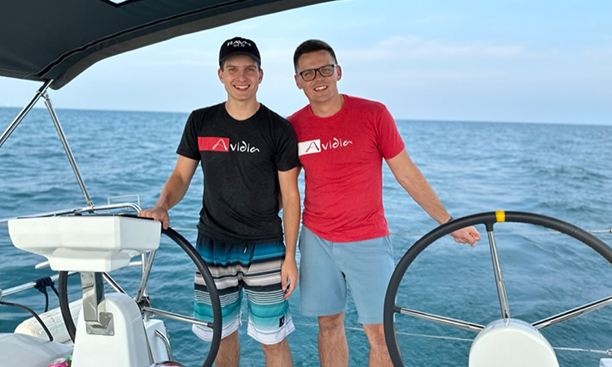 Avidia teammates sailing on the ocean