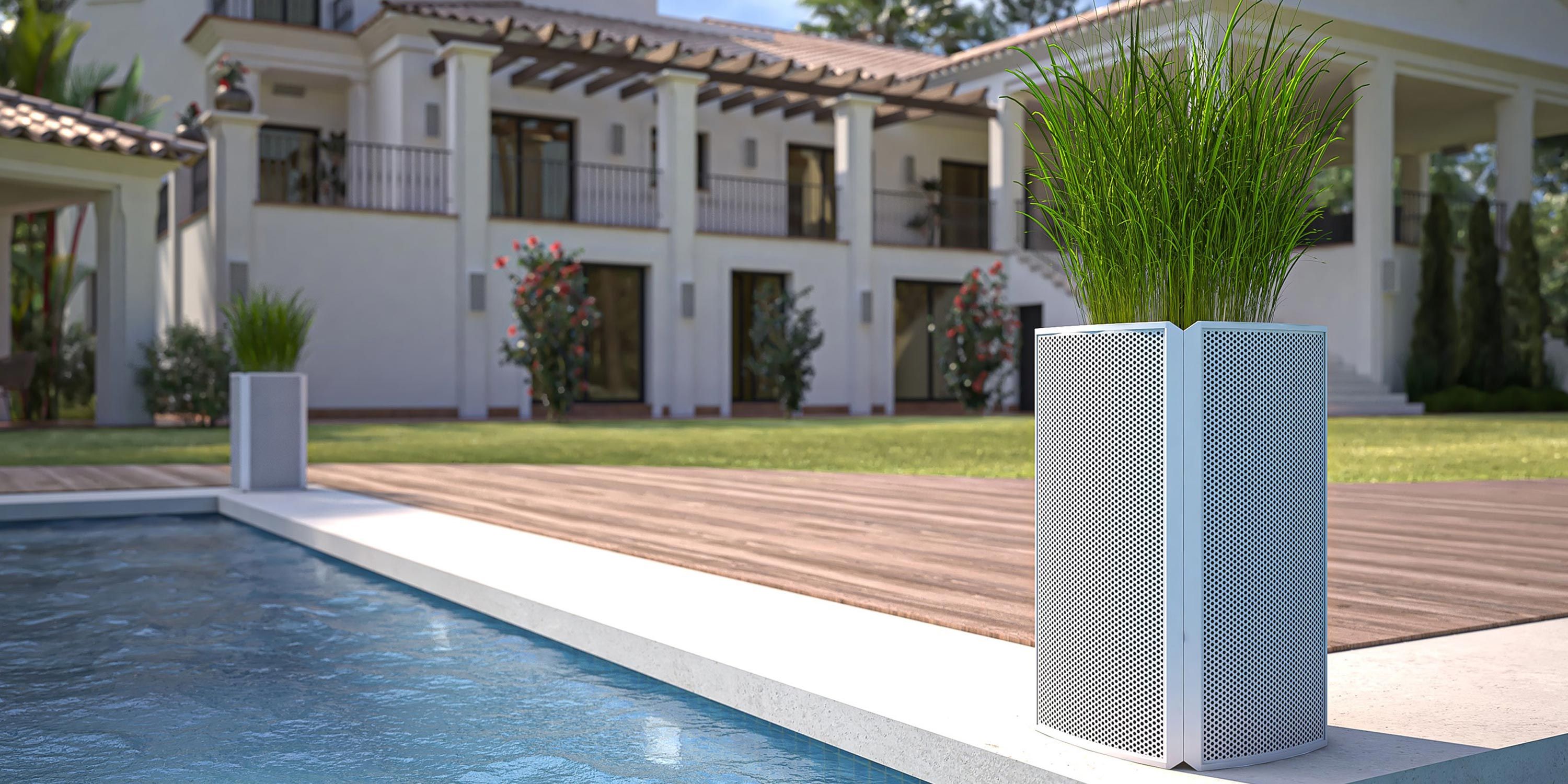 Coastal Source speakers at the side of a pool