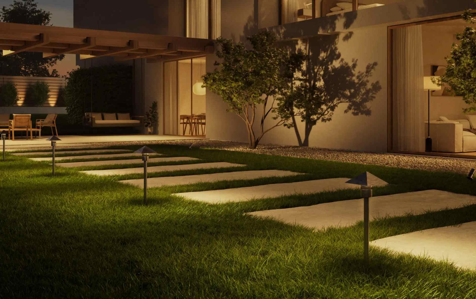 Solid brass low-voltage landscape lighting fixtures installed on a North Shore estate