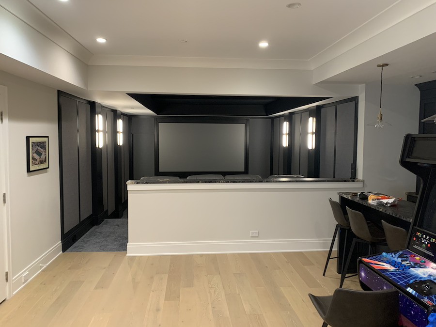 A home theater installation and setup connected to a home entertainment space.