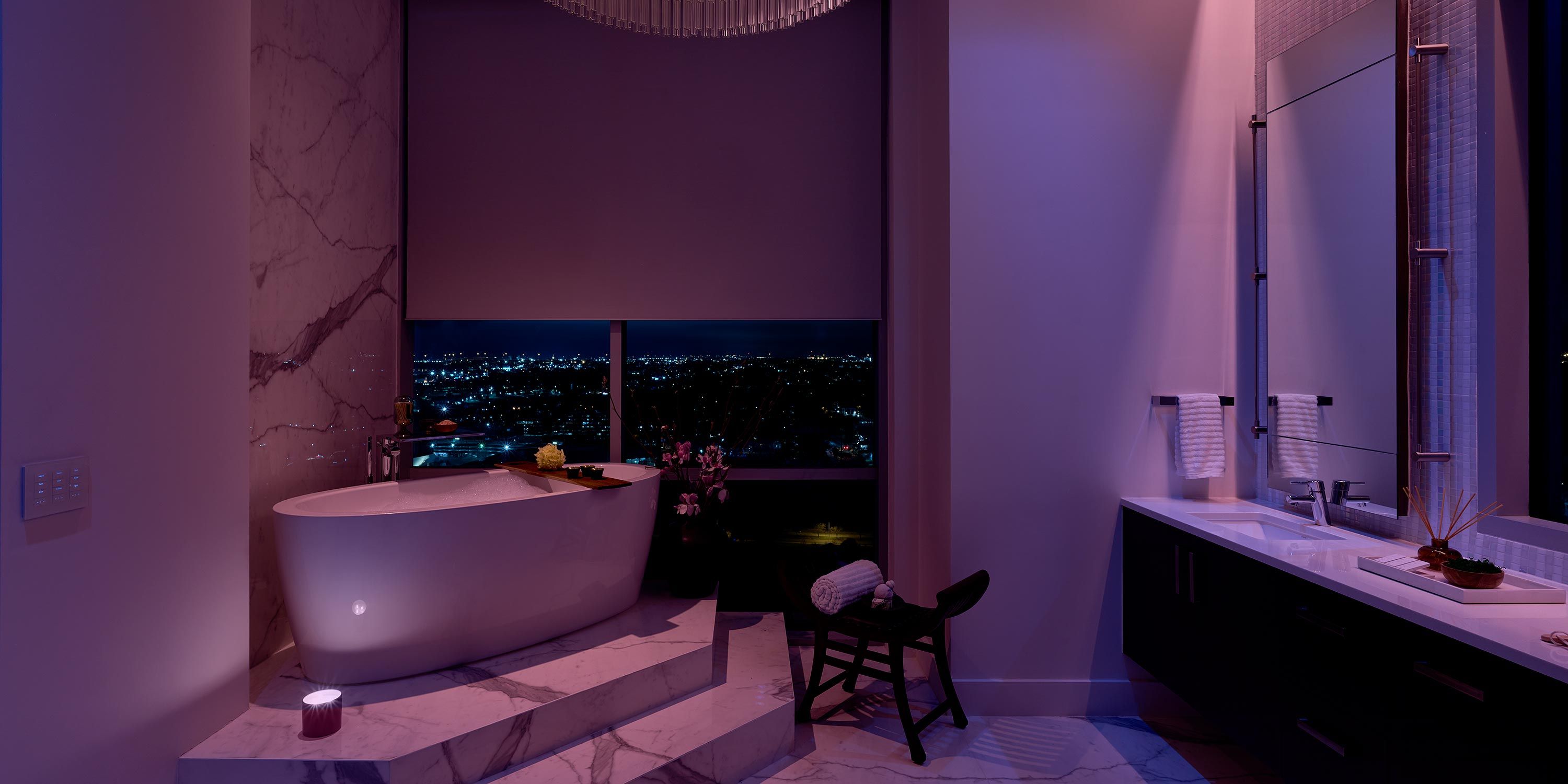 Bathroom at night with purple ketra light and Lutron Keypad